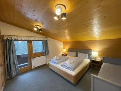 Ein Bett oder Betten in einem Zimmer der Unterkunft Buena Vista Mountain Lodge