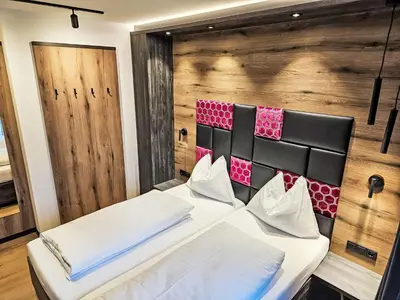 Ein Bett oder Betten in einem Zimmer der Unterkunft Chalet das rocking home by Interhome