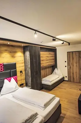 Ein Bett oder Betten in einem Zimmer der Unterkunft Chalet das rocking home by Interhome