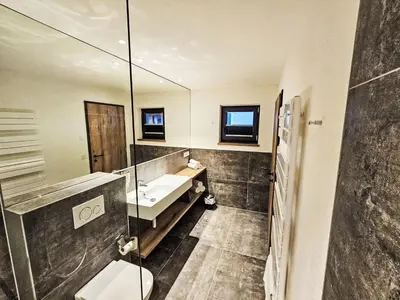 Ein Badezimmer in der Unterkunft Chalet das rocking home by Interhome