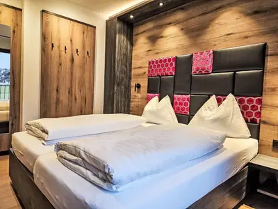 Ein Bett oder Betten in einem Zimmer der Unterkunft Chalet das rocking home by Interhome