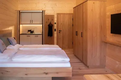 Ein Bett oder Betten in einem Zimmer der Unterkunft Tischlerhof