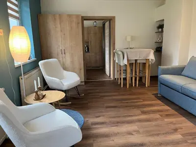Ein Sitzbereich in der Unterkunft Ferienwohnung Klausgasse Mittersill