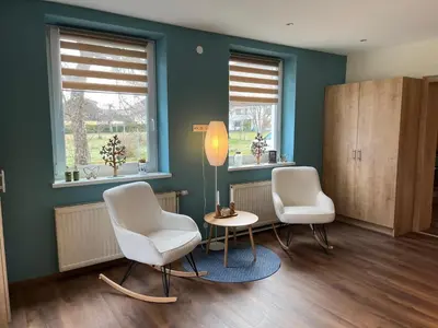 Ein Sitzbereich in der Unterkunft Ferienwohnung Klausgasse Mittersill