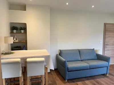 Ein Sitzbereich in der Unterkunft Ferienwohnung Klausgasse Mittersill