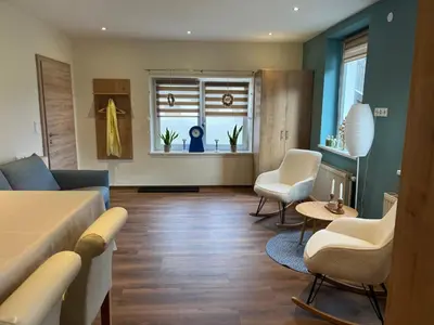 Ein Sitzbereich in der Unterkunft Ferienwohnung Klausgasse Mittersill