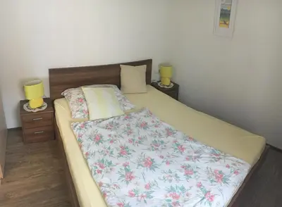 Ein Bett oder Betten in einem Zimmer der Unterkunft Ferienhaus Kopp