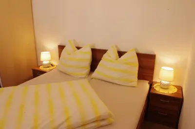 Ein Bett oder Betten in einem Zimmer der Unterkunft Ferienhaus Kopp