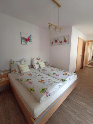Ein Bett oder Betten in einem Zimmer der Unterkunft Ferienhaus Kopp