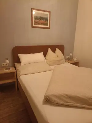 Ein Bett oder Betten in einem Zimmer der Unterkunft Ferienhaus Kopp