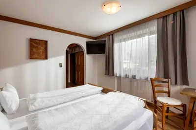 Ein Bett oder Betten in einem Zimmer der Unterkunft Gästehaus Berta