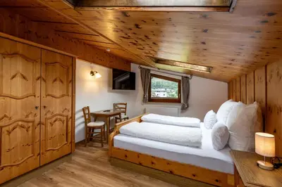 Ein Bett oder Betten in einem Zimmer der Unterkunft Ferienwohnung Berta