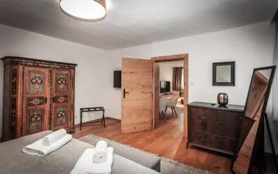Ein Bett oder Betten in einem Zimmer der Unterkunft DAS MANTINGER- Style - Blick- Tradition