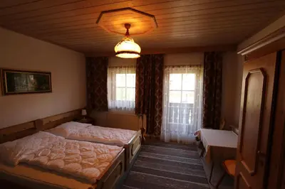 Ein Bett oder Betten in einem Zimmer der Unterkunft Schoberhof