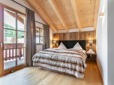 Ein Bett oder Betten in einem Zimmer der Unterkunft Kaiserblick Gasteig