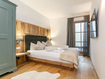 Ein Bett oder Betten in einem Zimmer der Unterkunft Kaiserblick Gasteig