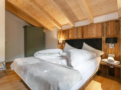 Ein Bett oder Betten in einem Zimmer der Unterkunft Kaiserblick Gasteig