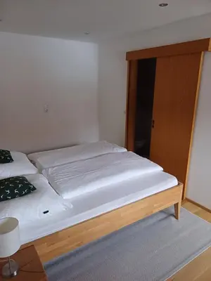 Ein Bett oder Betten in einem Zimmer der Unterkunft Mühlreithof