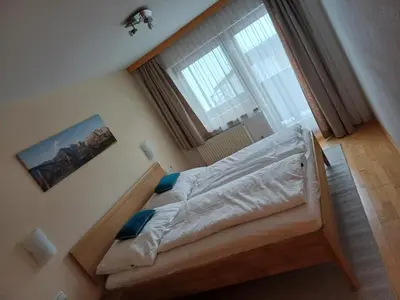 Ein Bett oder Betten in einem Zimmer der Unterkunft Mühlreithof