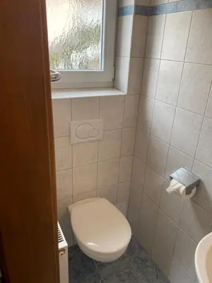 Ein Badezimmer in der Unterkunft FeWoKlocker