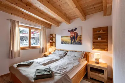 Ein Bett oder Betten in einem Zimmer der Unterkunft s' kleine Häusel
