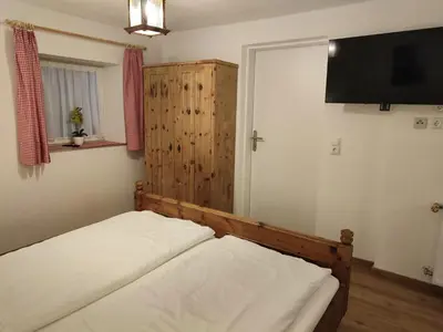 Ein Bett oder Betten in einem Zimmer der Unterkunft Ferienwohnung Juna