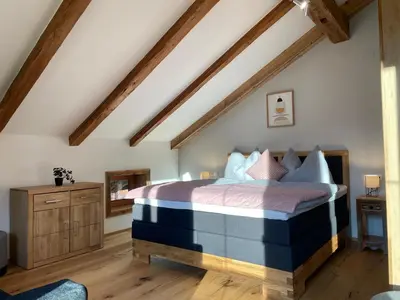 Ein Bett oder Betten in einem Zimmer der Unterkunft Ferienwohnung im Grünen