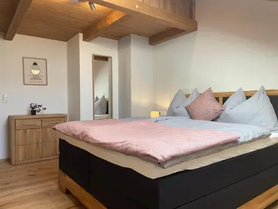 Ein Bett oder Betten in einem Zimmer der Unterkunft Ferienwohnung im Grünen
