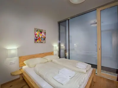 Ein Bett oder Betten in einem Zimmer der Unterkunft Apartment in Neukirchen near Ski Lift & Sauna
