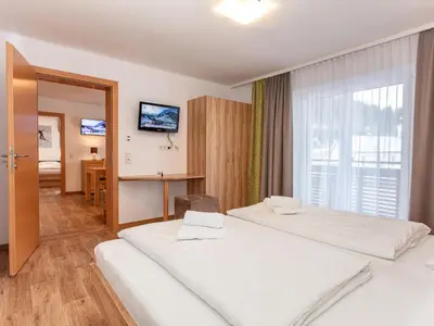 Ein Bett oder Betten in einem Zimmer der Unterkunft Appartements Hollin by we rent, JOKERCARD INCLUDED