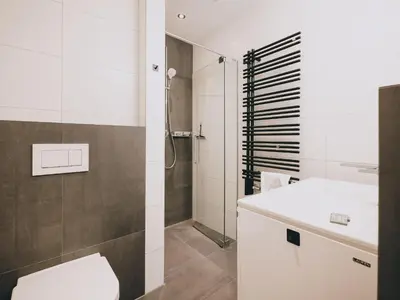 Ein Badezimmer in der Unterkunft Studio Niederseer by we rent, JOKERCARD INCLUDED