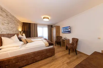 Ein Bett oder Betten in einem Zimmer der Unterkunft Villa Austria Saalbach