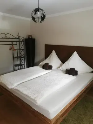 Ein Bett oder Betten in einem Zimmer der Unterkunft Ferienwohnung mit Charme