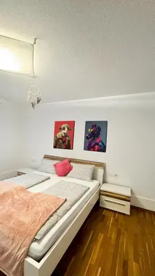 Ein Bett oder Betten in einem Zimmer der Unterkunft Apartment Kunterbunt