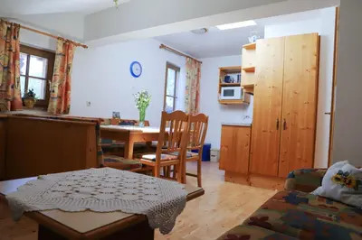 Ein Sitzbereich in der Unterkunft Stablerhof