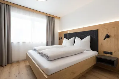 Ein Bett oder Betten in einem Zimmer der Unterkunft Apparthaus Anderl