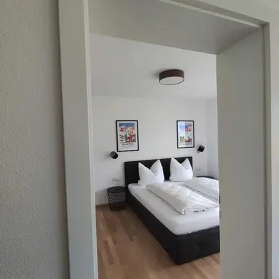 Ein Bett oder Betten in einem Zimmer der Unterkunft Apart Loris
