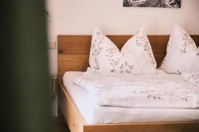 Ein Bett oder Betten in einem Zimmer der Unterkunft Haus Edelweiss