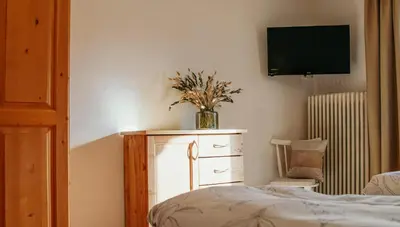 Ein Bett oder Betten in einem Zimmer der Unterkunft Haus Edelweiss