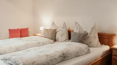Ein Bett oder Betten in einem Zimmer der Unterkunft Haus Edelweiss