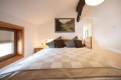 Ein Bett oder Betten in einem Zimmer der Unterkunft Leindlhof