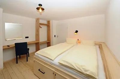 Ein Bett oder Betten in einem Zimmer der Unterkunft Chalet Unterellmau