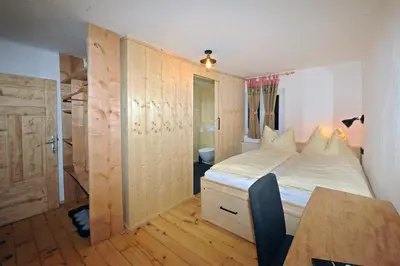 Ein Bett oder Betten in einem Zimmer der Unterkunft Chalet Unterellmau