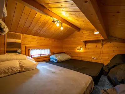 Ein Bett oder Betten in einem Zimmer der Unterkunft Pauls-Hütte