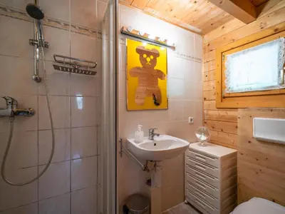 Ein Badezimmer in der Unterkunft Pauls-Hütte