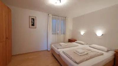 Ein Bett oder Betten in einem Zimmer der Unterkunft Haus Carina