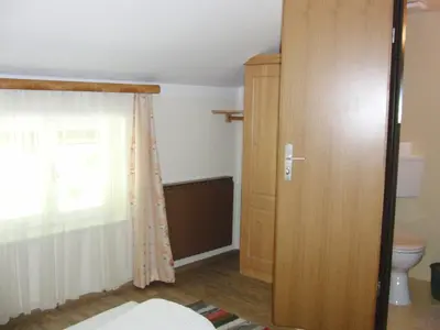 Ein Bett oder Betten in einem Zimmer der Unterkunft Gästehaus Loithaler