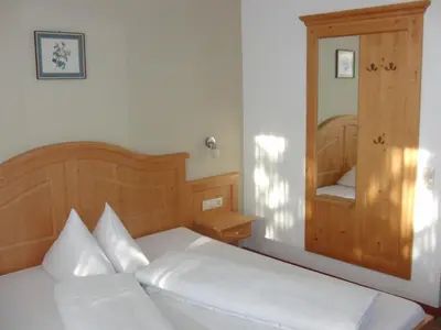 Ein Bett oder Betten in einem Zimmer der Unterkunft Gästehaus Loithaler