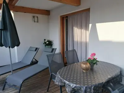 Ein Sitzbereich in der Unterkunft Ferienwohnung Achhorner