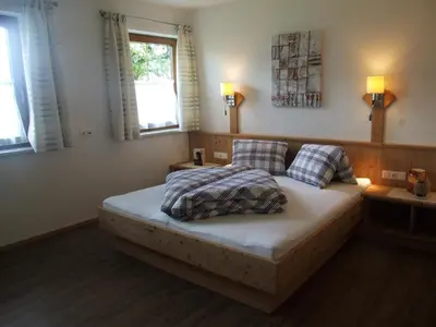 Ein Bett oder Betten in einem Zimmer der Unterkunft Ferienwohnung Lehenhof